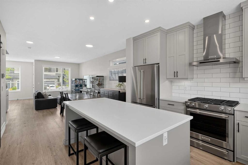 374 Wolf Creek Manor Se, Calgary, AB - Indoor Photo Showing Kitchen With Upgraded Kitchen