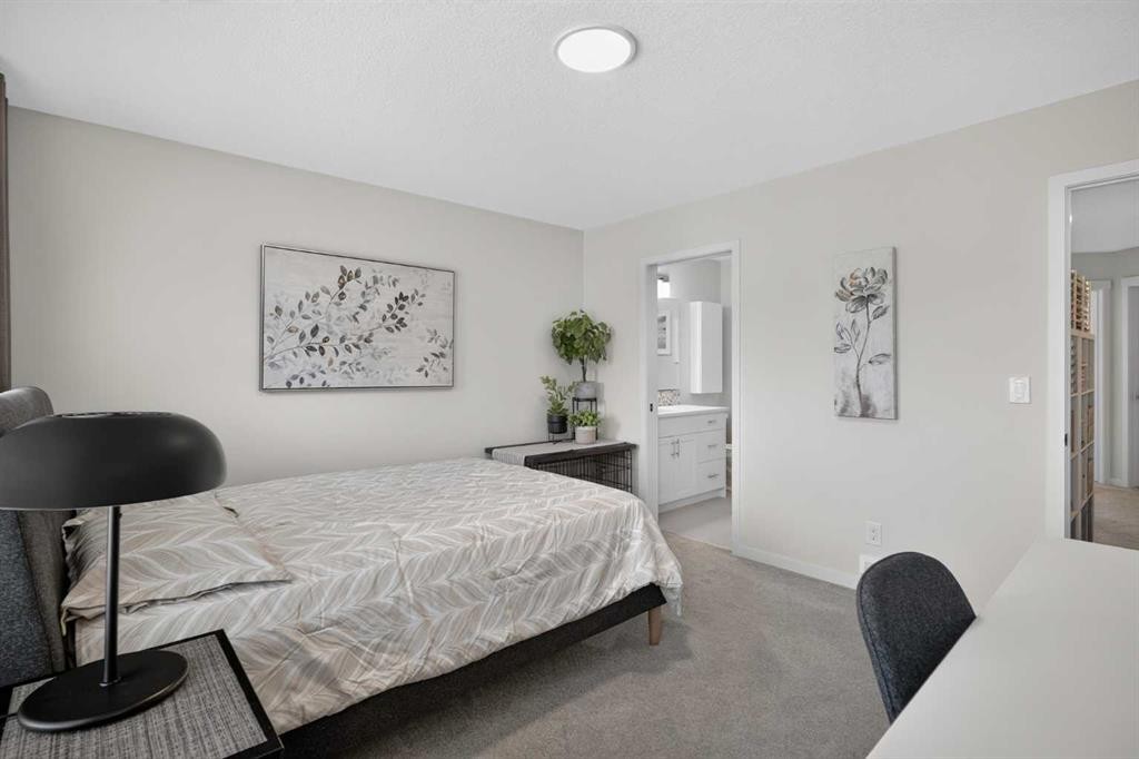 374 Wolf Creek Manor Se, Calgary, AB - Indoor Photo Showing Bedroom