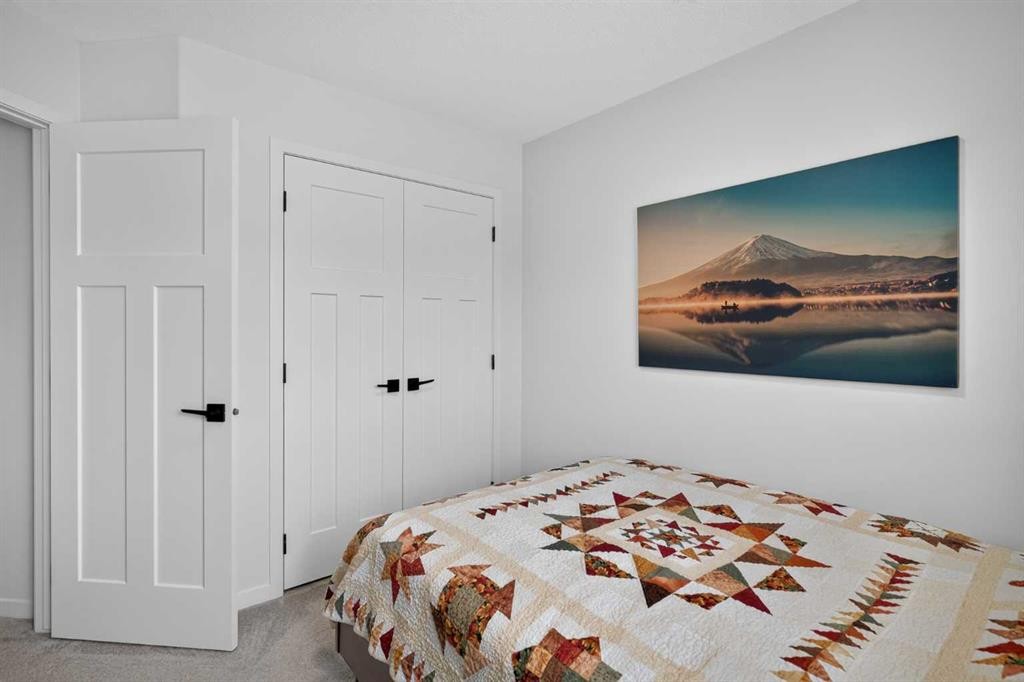 374 Wolf Creek Manor Se, Calgary, AB - Indoor Photo Showing Bedroom