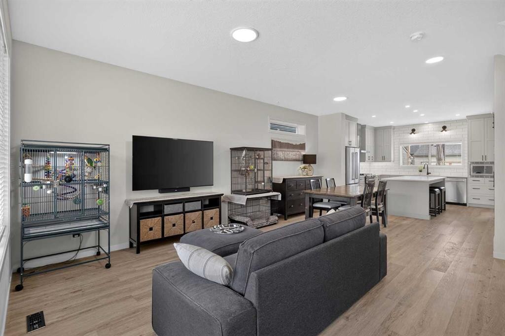 374 Wolf Creek Manor Se, Calgary, AB - Indoor Photo Showing Living Room
