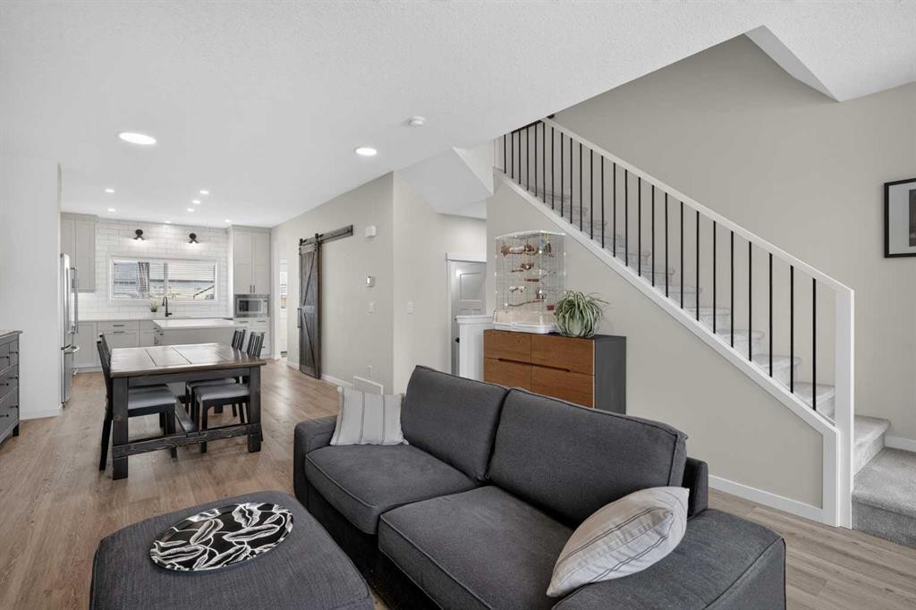 374 Wolf Creek Manor Se, Calgary, AB - Indoor Photo Showing Living Room
