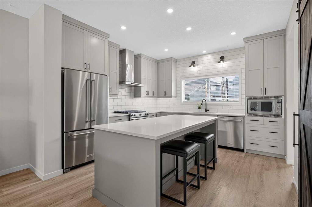 374 Wolf Creek Manor Se, Calgary, AB - Indoor Photo Showing Kitchen With Upgraded Kitchen