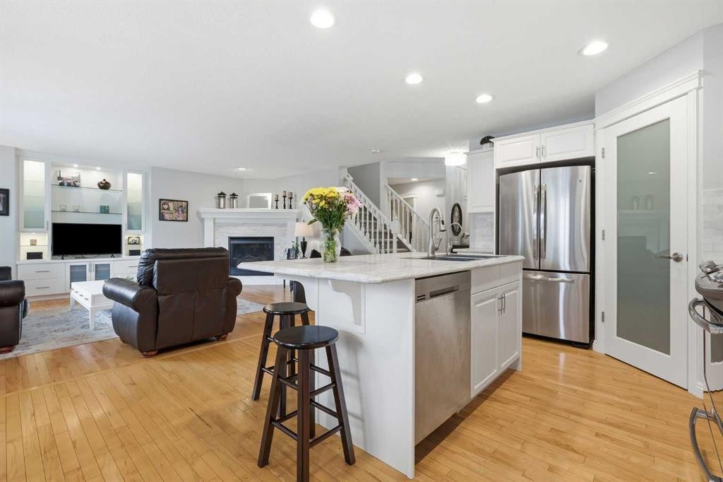 182 Kincora Park Nw, Calgary, AB - Indoor Photo Showing Kitchen With Fireplace With Stainless Steel Kitchen With Upgraded Kitchen