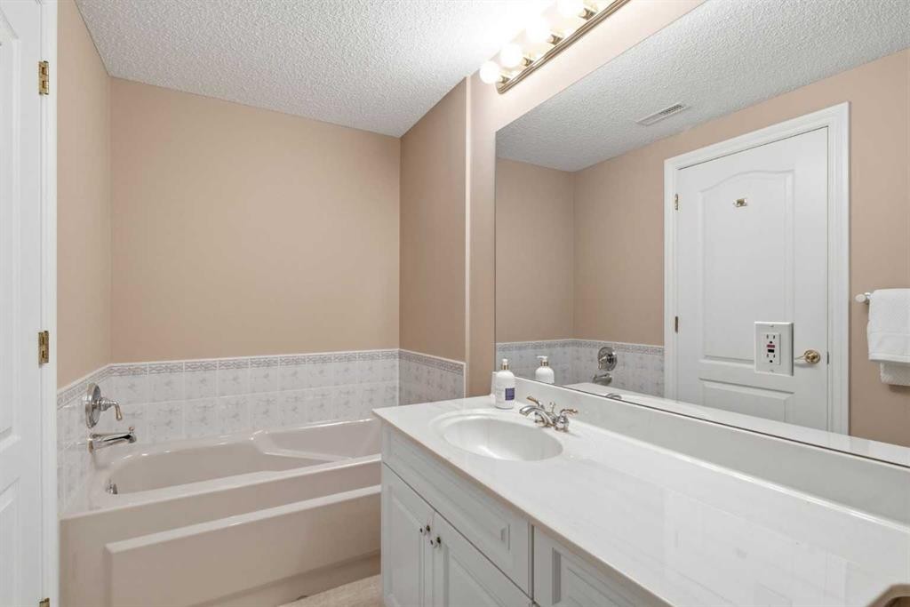 60 Prominence Point Sw, Calgary, AB - Indoor Photo Showing Bathroom