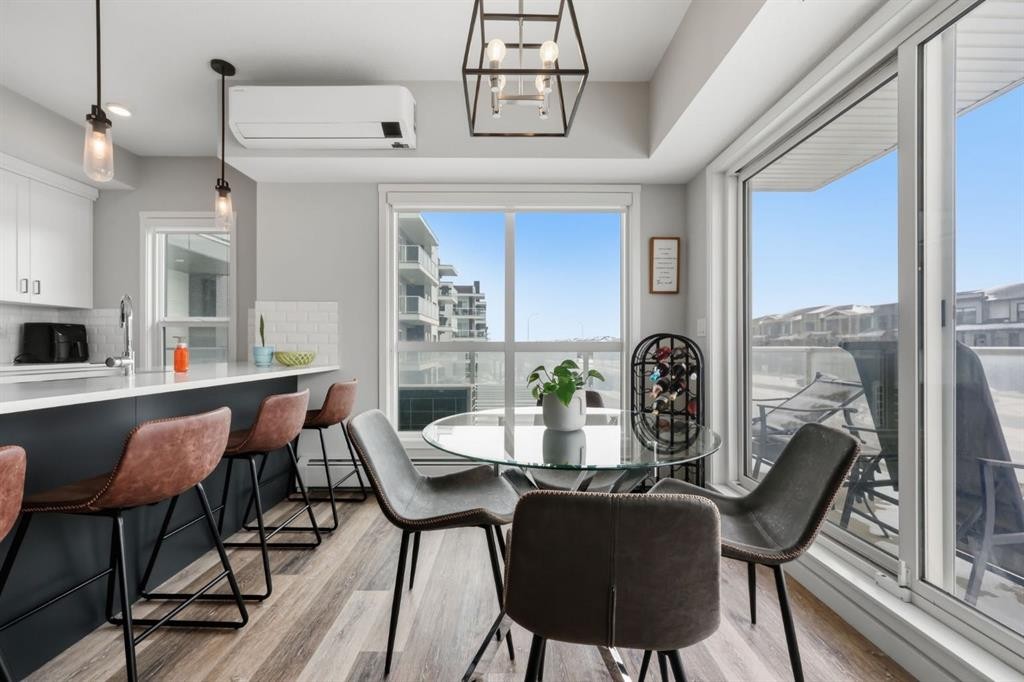 224-4150 Seton Drive Se, Calgary, AB - Indoor Photo Showing Dining Room