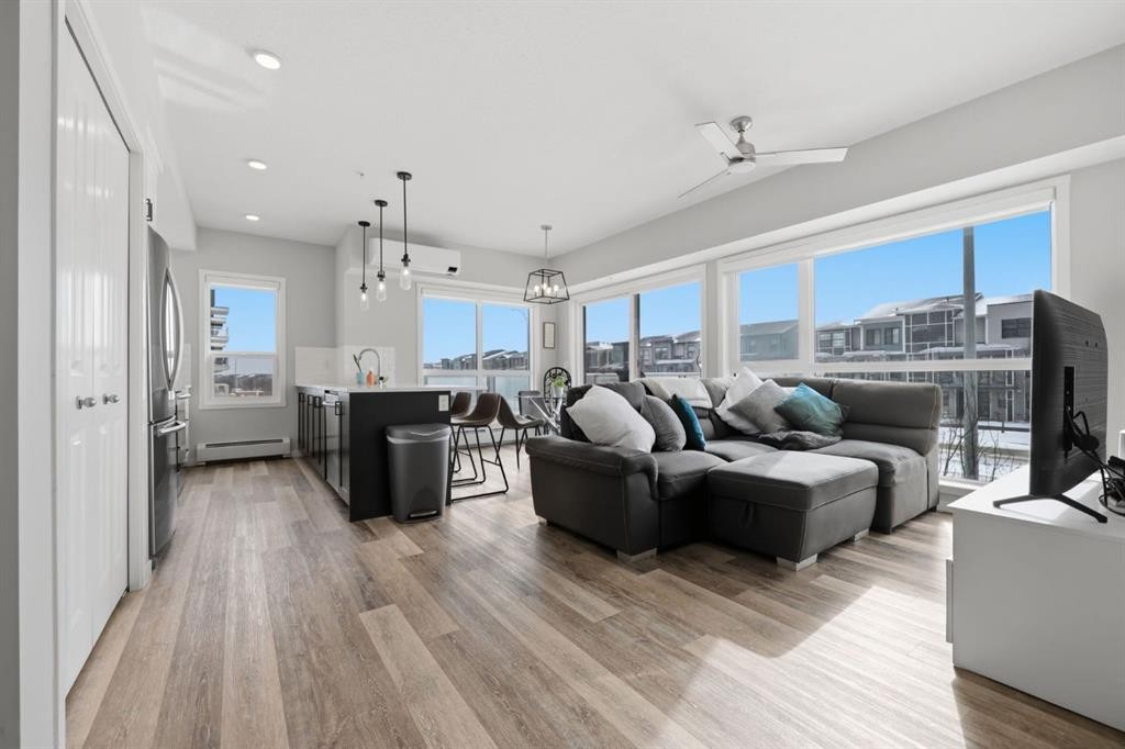 224-4150 Seton Drive Se, Calgary, AB - Indoor Photo Showing Living Room