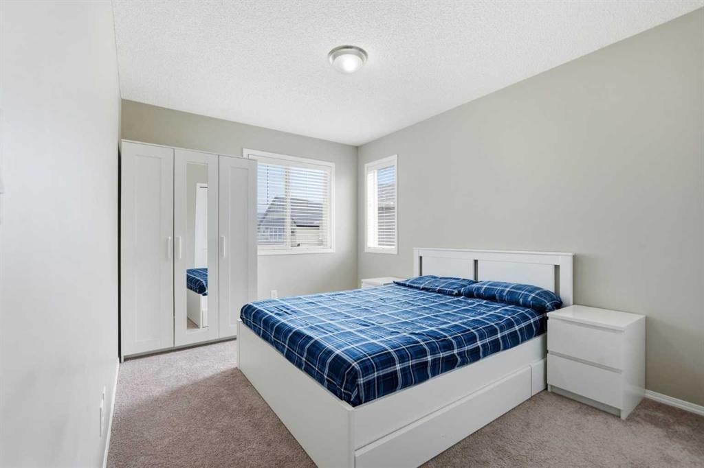 79 Nolanfield Court Nw, Calgary, AB - Indoor Photo Showing Bedroom