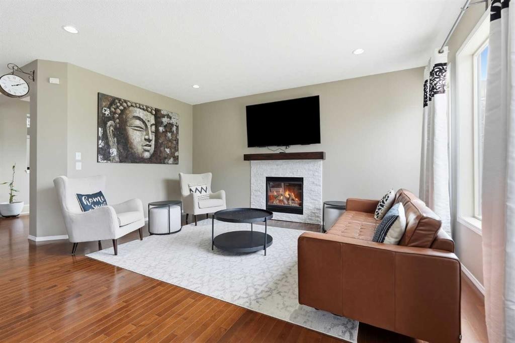 79 Nolanfield Court Nw, Calgary, AB - Indoor Photo Showing Living Room With Fireplace