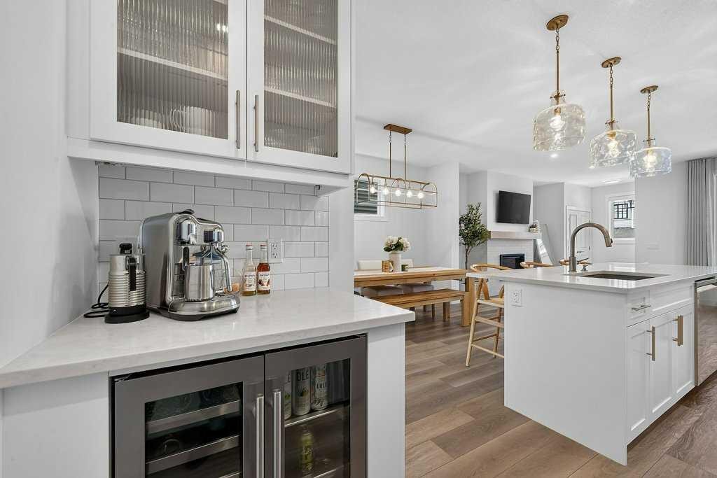 97 Rowmont Heath Nw, Calgary, AB - Indoor Photo Showing Kitchen With Upgraded Kitchen