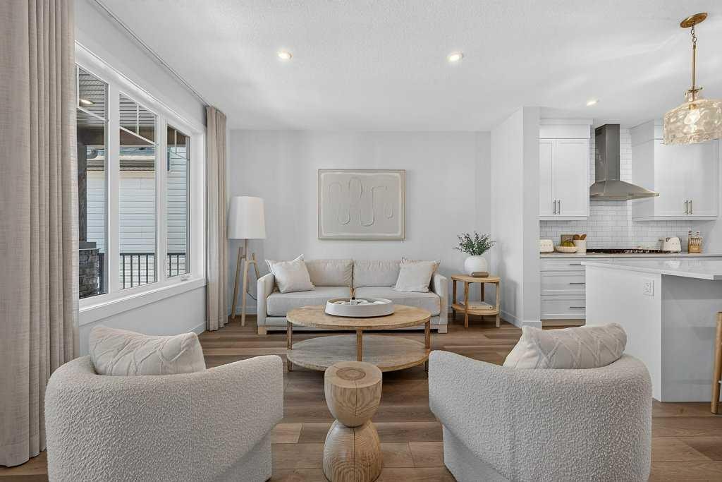 97 Rowmont Heath Nw, Calgary, AB - Indoor Photo Showing Living Room