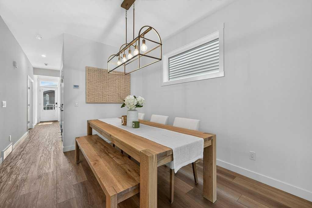 97 Rowmont Heath Nw, Calgary, AB - Indoor Photo Showing Dining Room