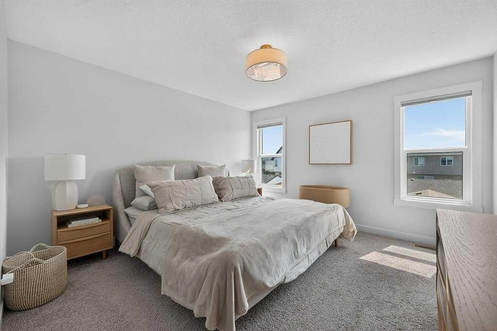 97 Rowmont Heath Nw, Calgary, AB - Indoor Photo Showing Bedroom