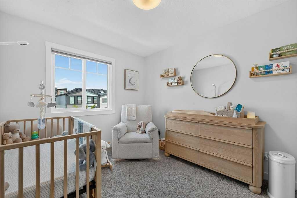 97 Rowmont Heath Nw, Calgary, AB - Indoor Photo Showing Other Room