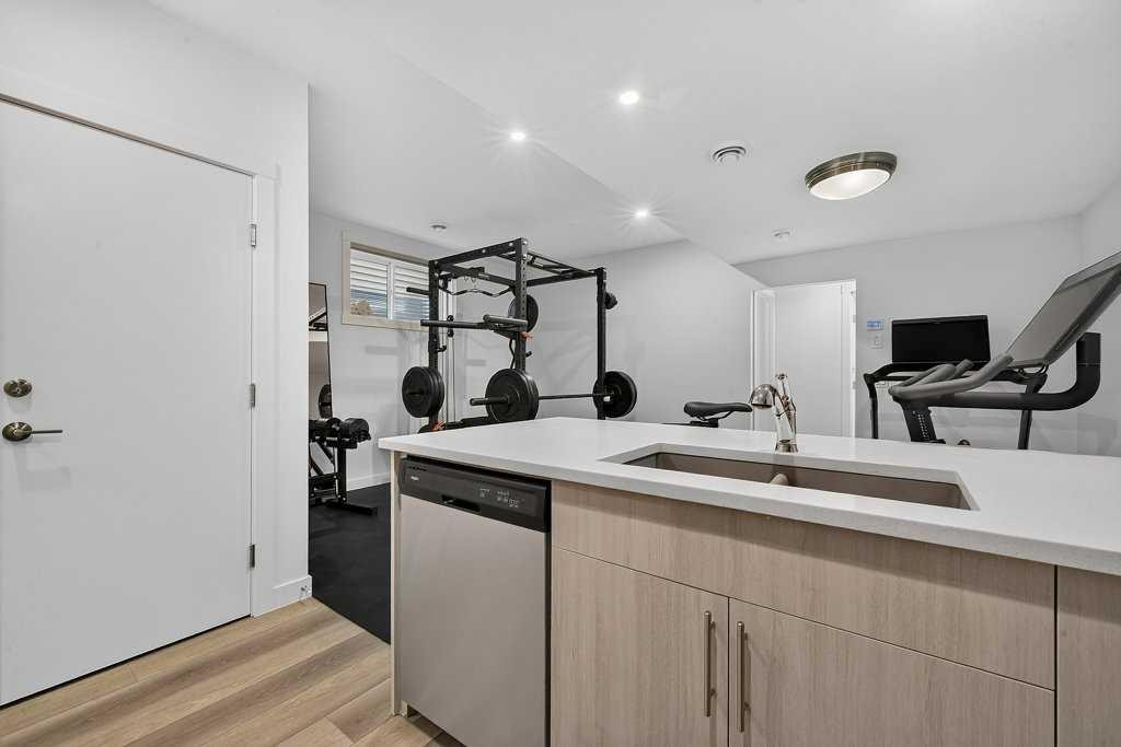 97 Rowmont Heath Nw, Calgary, AB - Indoor Photo Showing Other Room