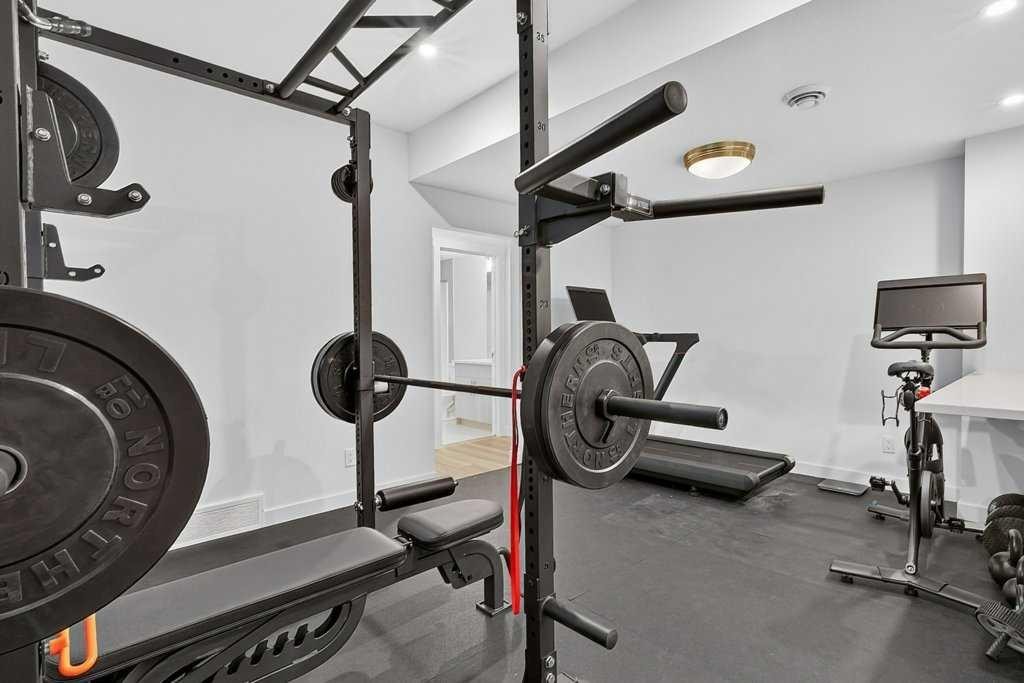 97 Rowmont Heath Nw, Calgary, AB - Indoor Photo Showing Gym Room