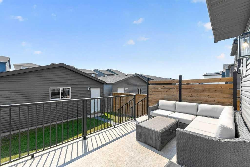 97 Rowmont Heath Nw, Calgary, AB - Outdoor With Deck Patio Veranda With Exterior