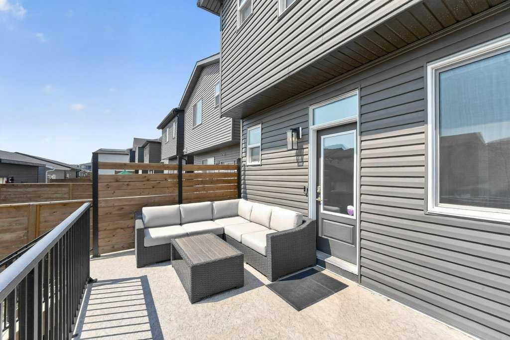 97 Rowmont Heath Nw, Calgary, AB - Outdoor With Deck Patio Veranda With Exterior
