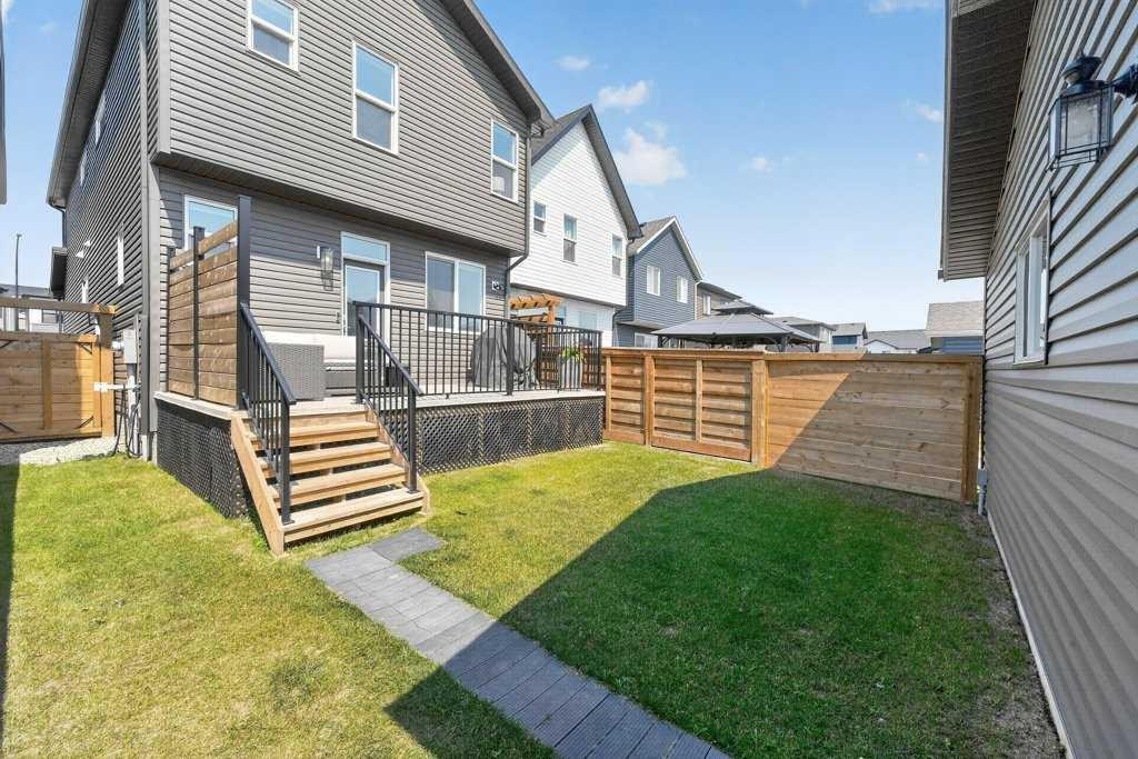 97 Rowmont Heath Nw, Calgary, AB - Outdoor With Deck Patio Veranda