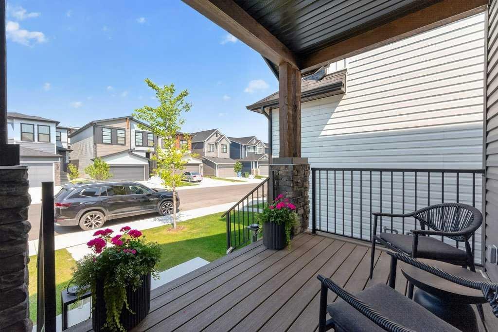97 Rowmont Heath Nw, Calgary, AB - Outdoor With Deck Patio Veranda With Exterior