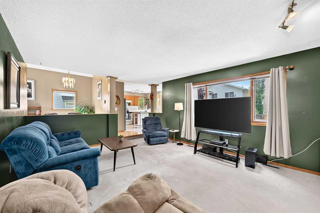 228 Arbour Ridge Way Nw, Calgary, AB - Indoor Photo Showing Living Room