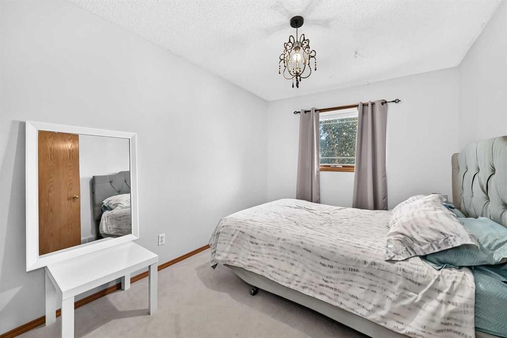 228 Arbour Ridge Way Nw, Calgary, AB - Indoor Photo Showing Bedroom