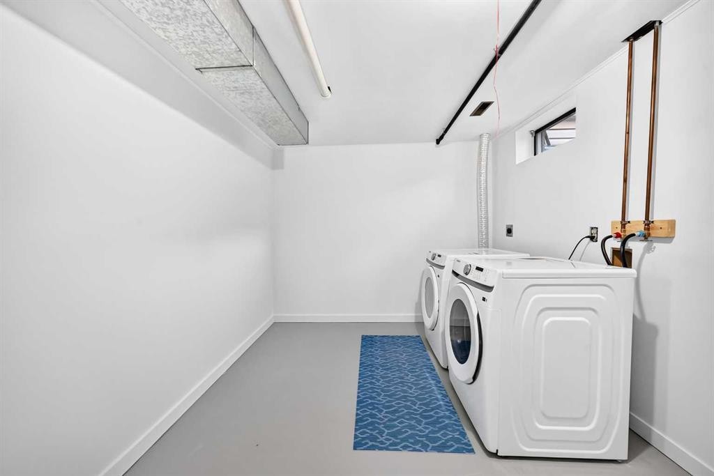 135 Woodsman Lane Sw, Calgary, AB - Indoor Photo Showing Laundry Room