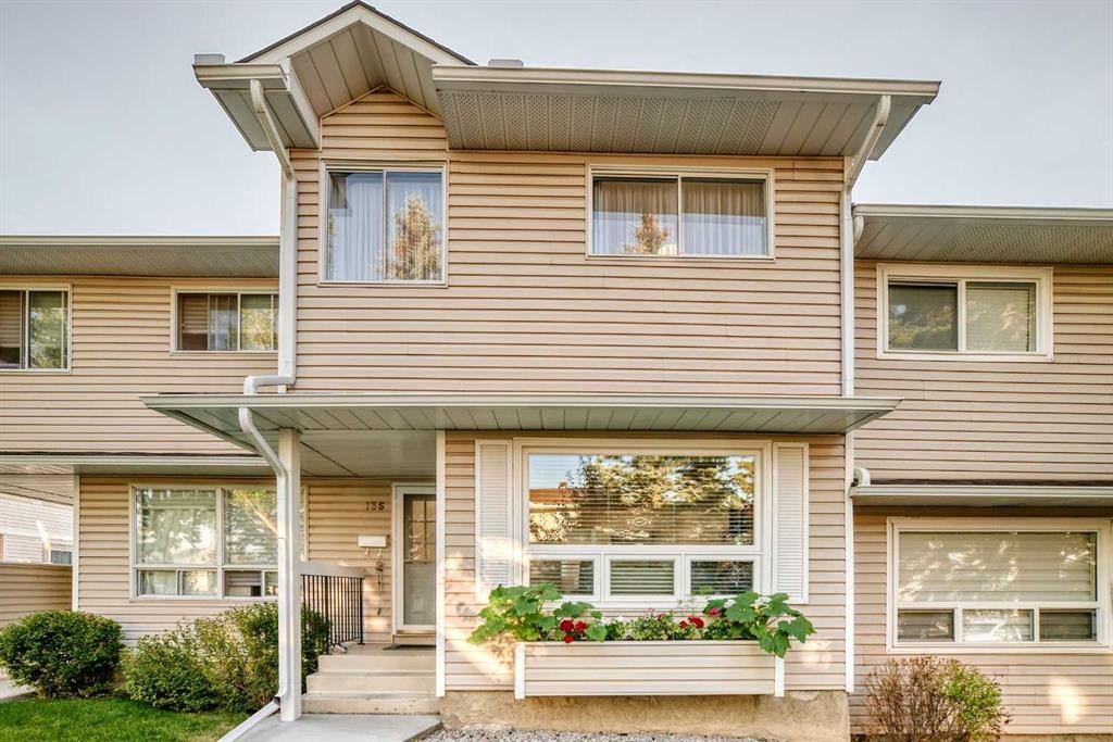 135 Woodsman Lane Sw, Calgary, AB - Outdoor With Facade