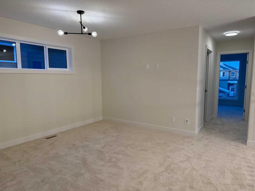 111 Sundown Crescent, Cochrane, AB - Indoor Photo Showing Other Room