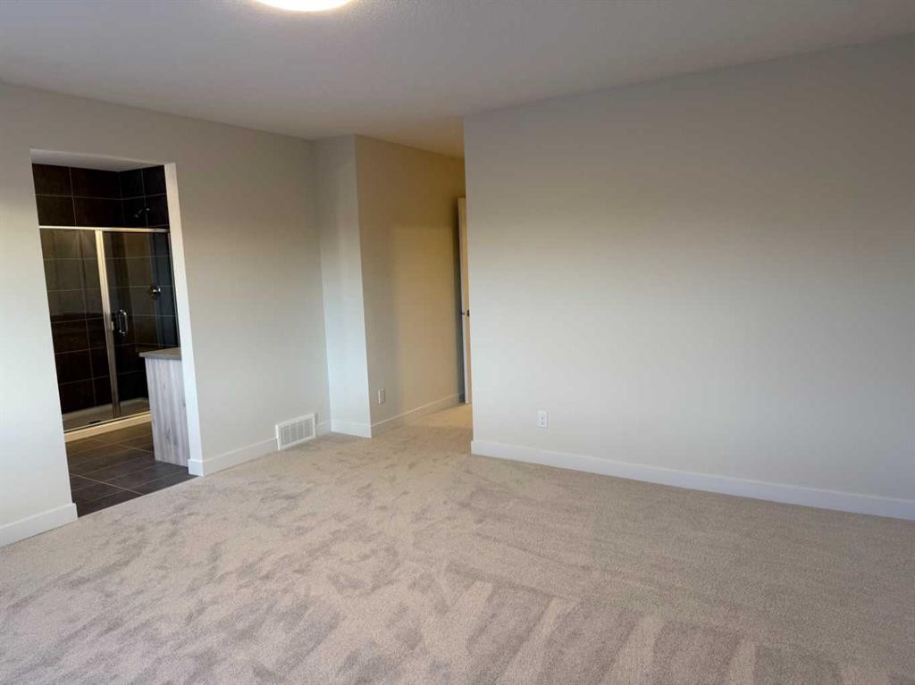 111 Sundown Crescent, Cochrane, AB - Indoor Photo Showing Other Room