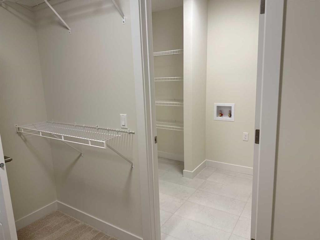111 Sundown Crescent, Cochrane, AB - Indoor With Storage