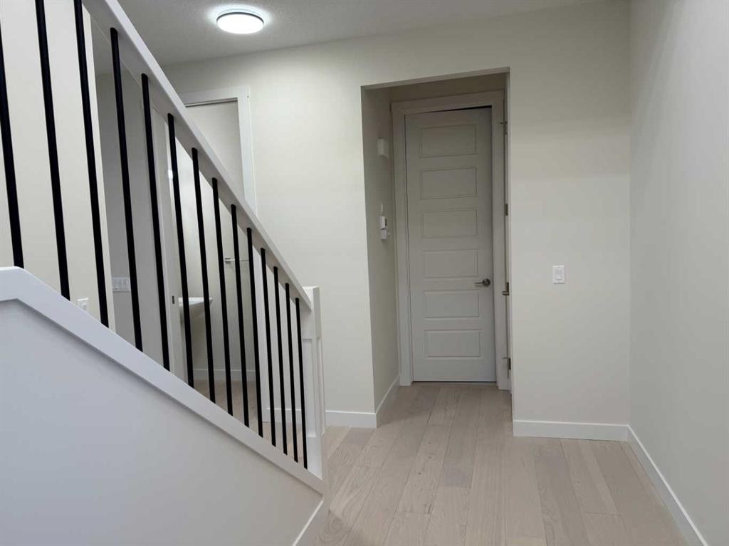 111 Sundown Crescent, Cochrane, AB - Indoor Photo Showing Other Room