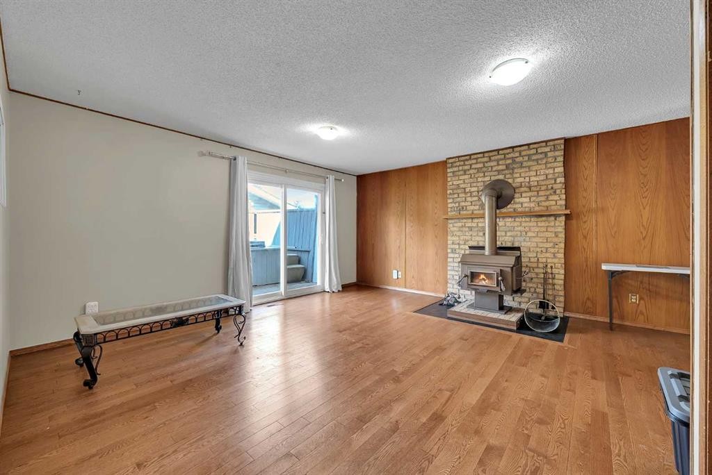28 Macewan Meadow Link Nw, Calgary, AB - Indoor With Fireplace