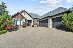 527 Montclair Place Cochrane Lake, AB T4C 0A8