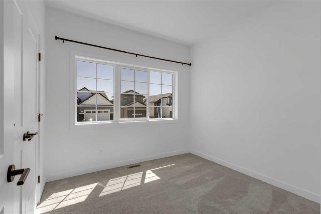9 Ian Way, Sylvan Lake, AB - Indoor Photo Showing Other Room
