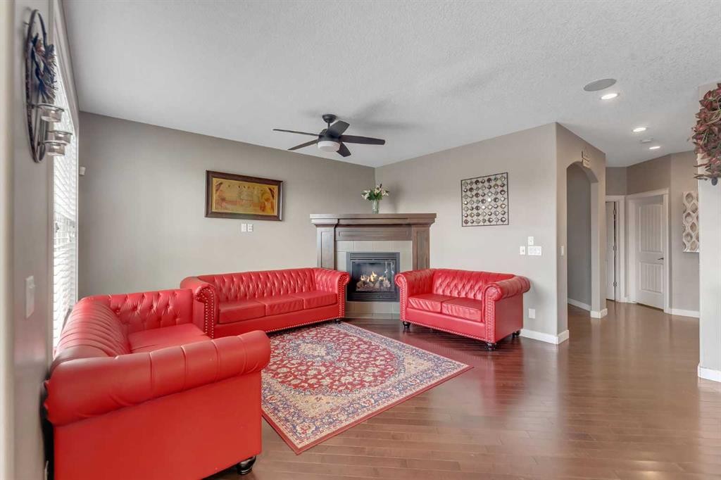 130 Brightonwoods Grove Se, Calgary, AB - Indoor Photo Showing Living Room With Fireplace