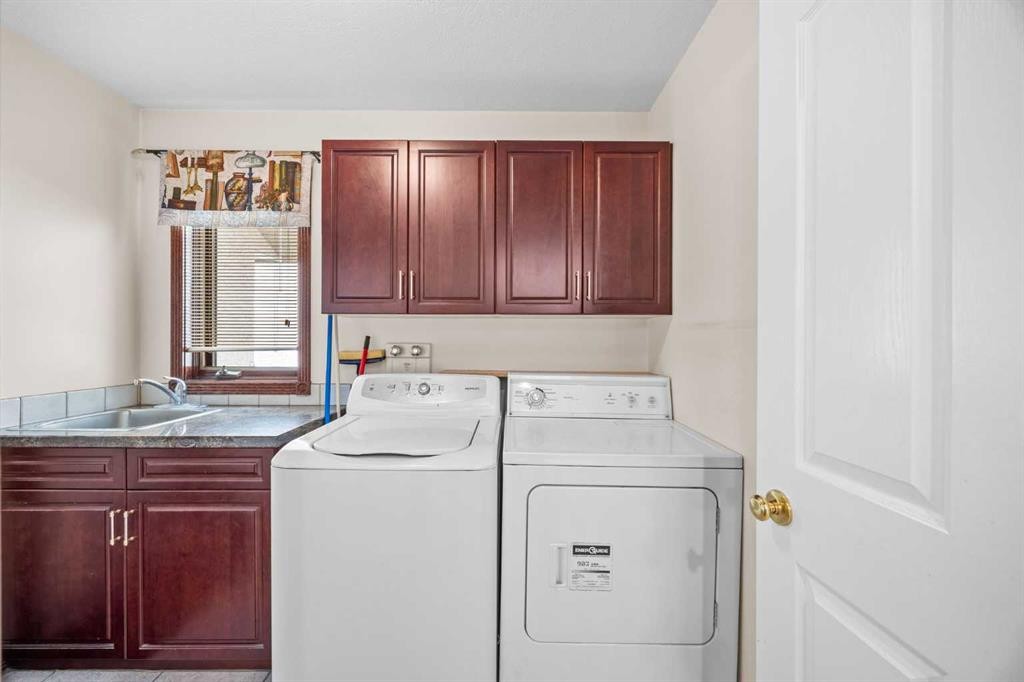 10385 Hamptons Boulevard Nw, Calgary, AB - Indoor Photo Showing Laundry Room
