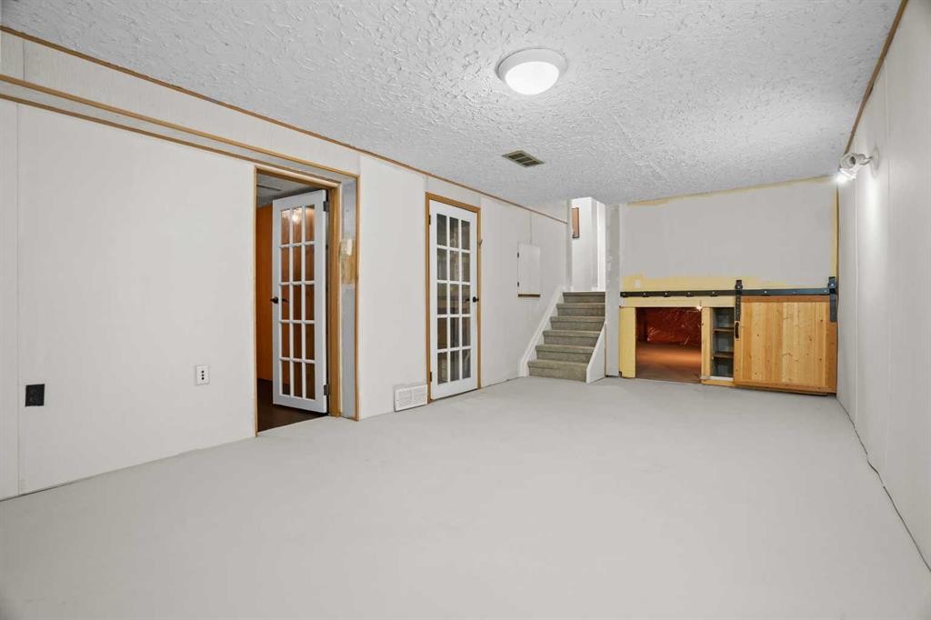 147 Manora Hill Ne, Calgary, AB