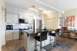 202-141 Mountain Street Cochrane, AB T4C 1Z5