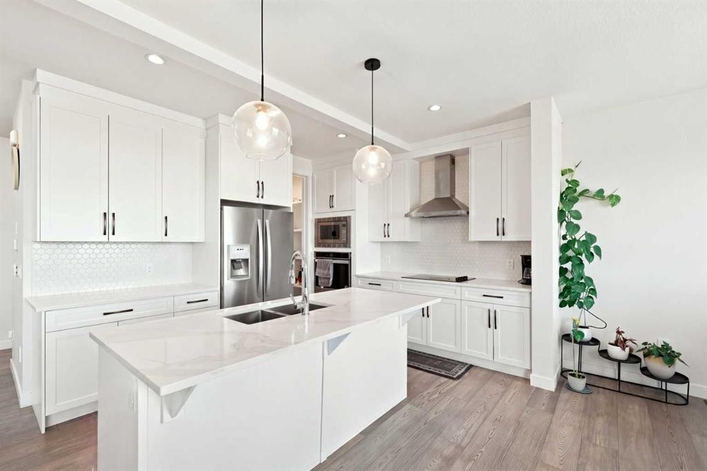 170 Chelsea Road, Chestermere, AB - Indoor Photo Showing Kitchen With Stainless Steel Kitchen With Double Sink With Upgraded Kitchen