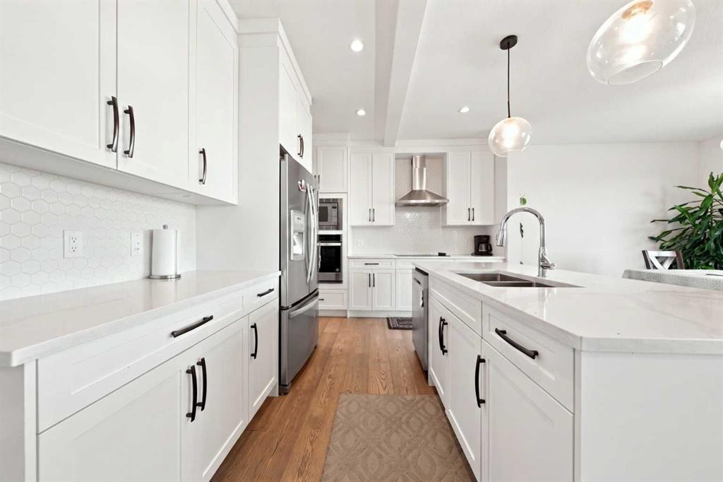 170 Chelsea Road, Chestermere, AB - Indoor Photo Showing Kitchen With Double Sink With Upgraded Kitchen