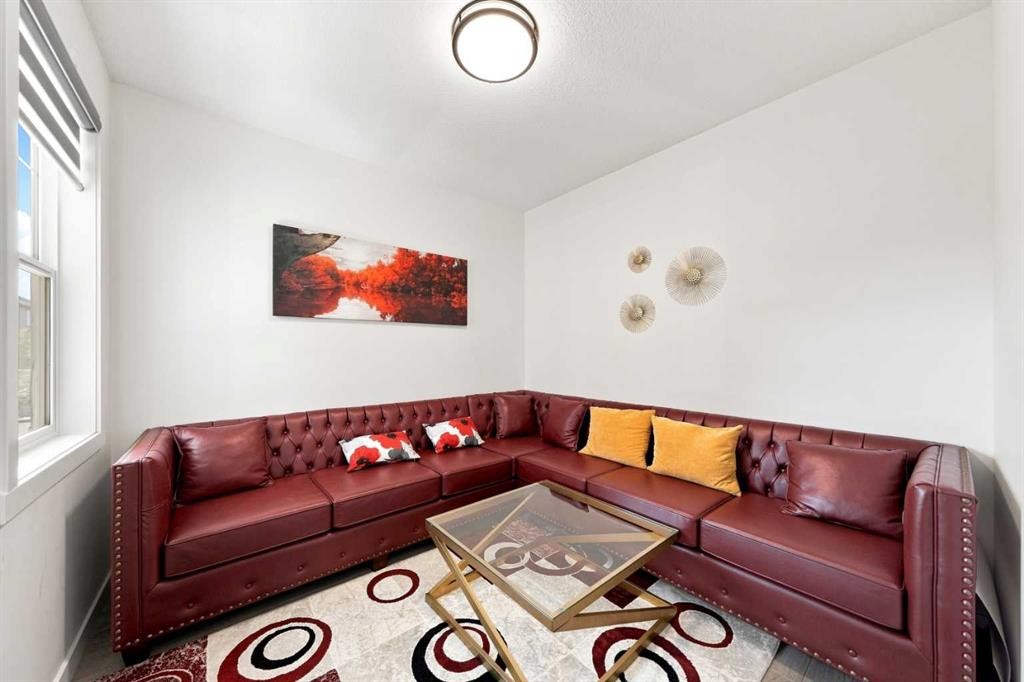 170 Chelsea Road, Chestermere, AB - Indoor Photo Showing Living Room