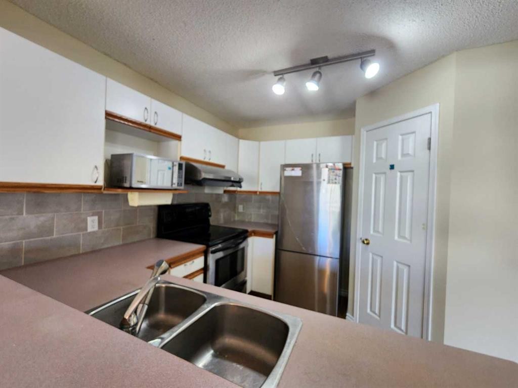 717 Harvest Hills Drive Ne, Calgary, AB
