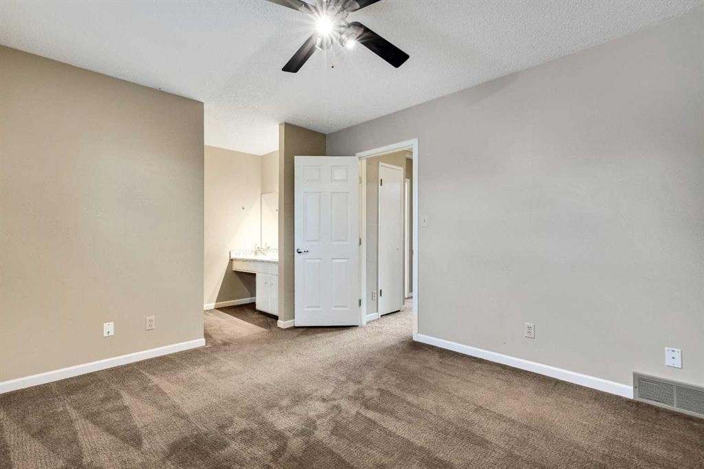 105-107 Elm Place, Okotoks, AB