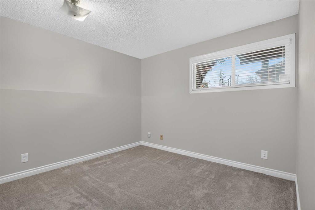 112 Beaconsfield Rise Nw, Calgary, AB