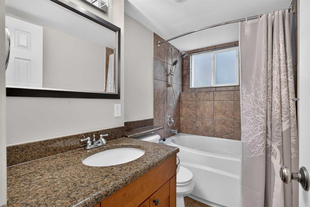 112 Beaconsfield Rise Nw, Calgary, AB