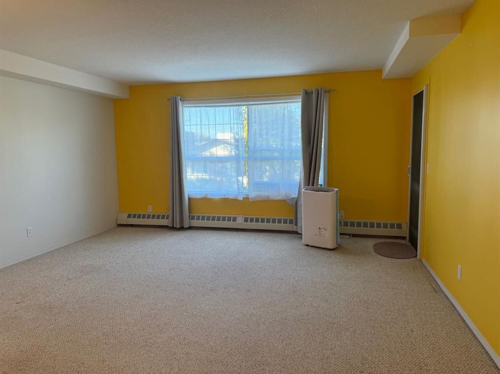 204-105 7 Avenue Se, High River, AB