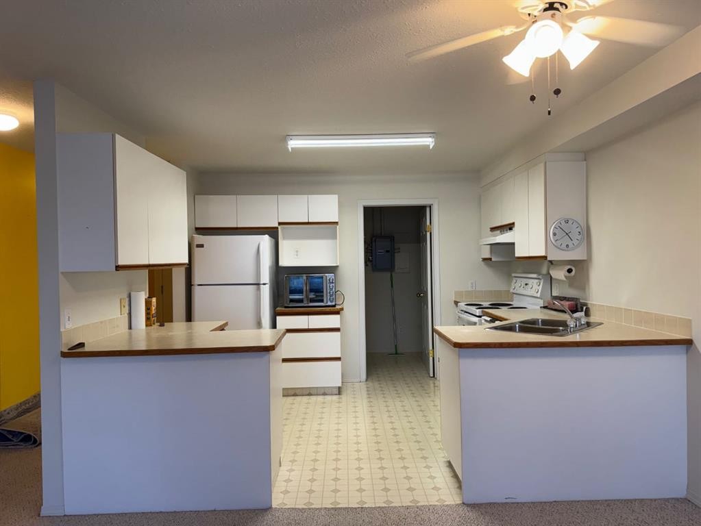 204-105 7 Avenue Se, High River, AB