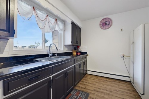 704 75 Avenue Sw, Calgary, AB 