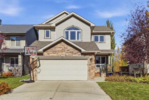 76 Crystal Green Drive  Okotoks, AB T1S 2N7