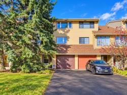 302 Woodvale Crescent SW Calgary, AB T2W 3P3